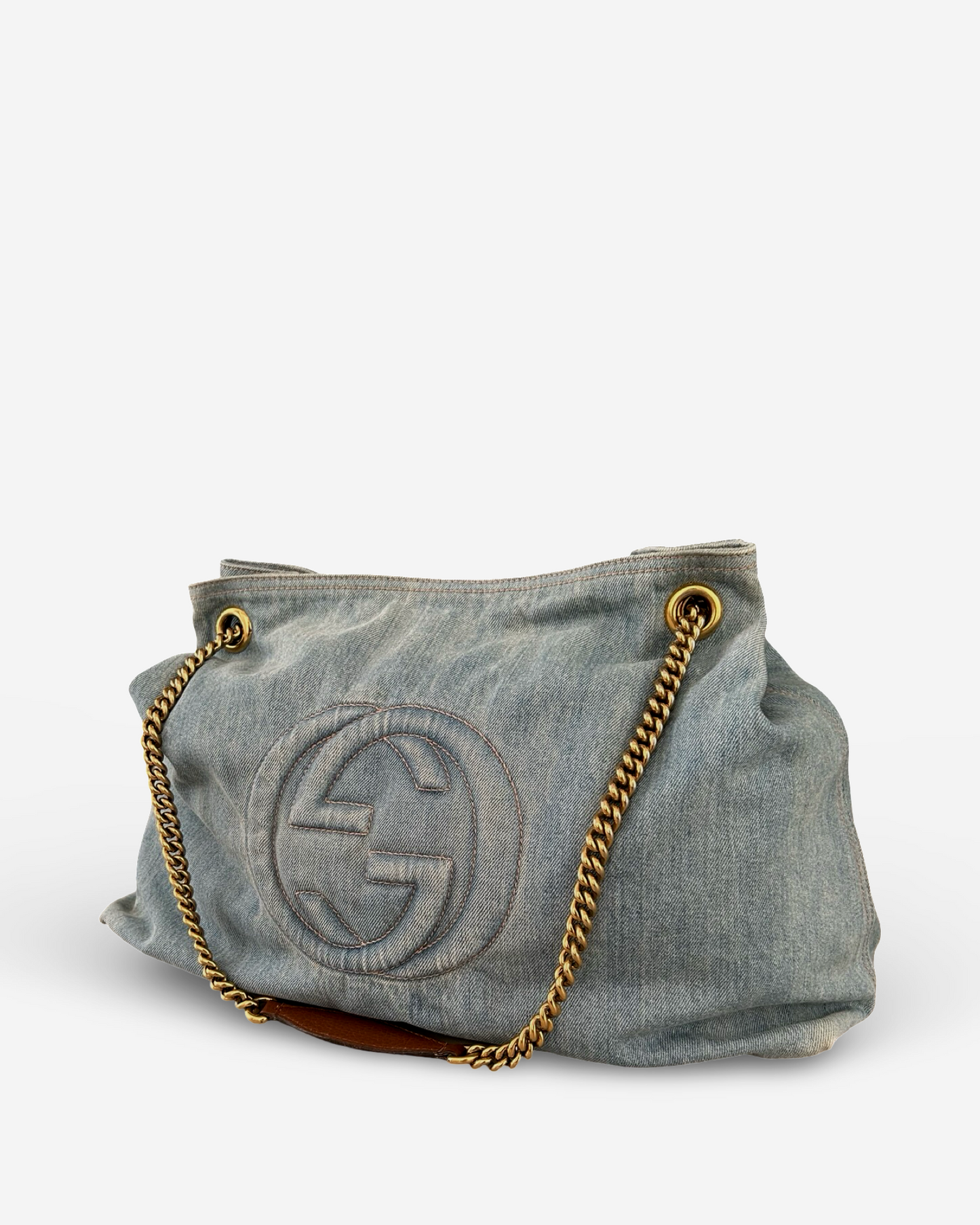 Alternate side view Used Gucci Soho Shoulder Bag 308982 in navy blue denim – side profile with wide strap