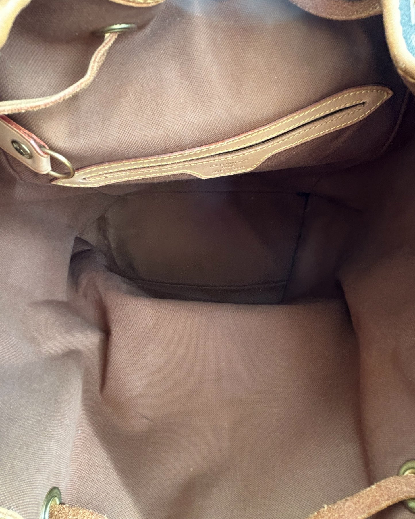 nside view of louis vuitton backpack with textile lining