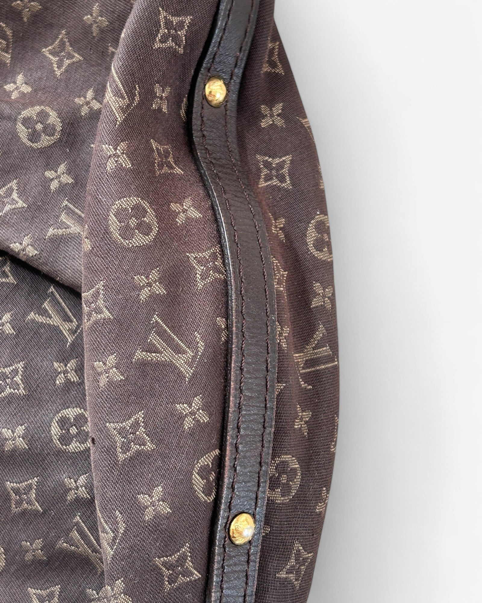hardware detail on Louis Vuitton Idylle Rhapsody MM – vintage designer crossbody bag