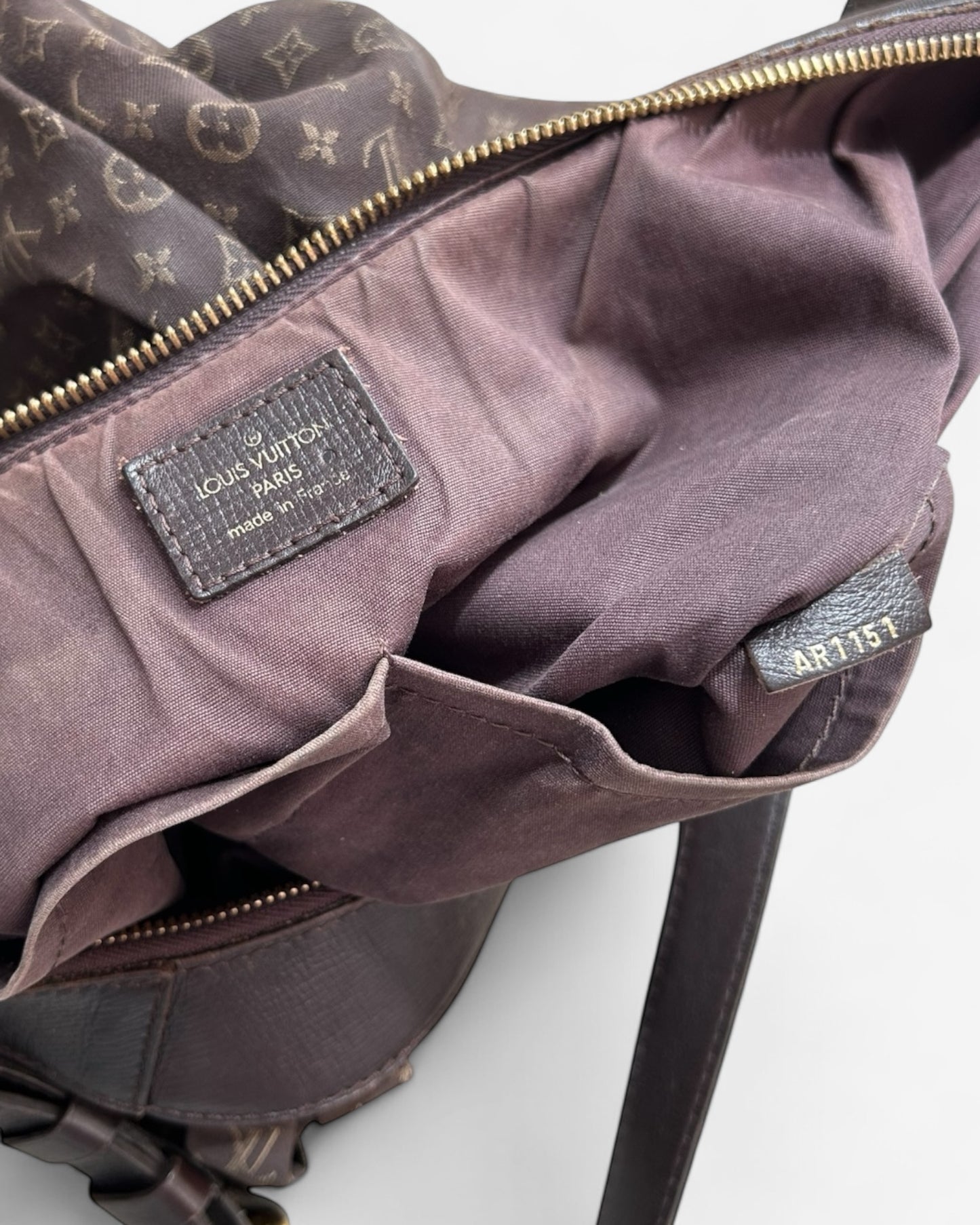 ingterior Close-up of Louis Vuitton Idylle Rhapsody MM in brown canvas