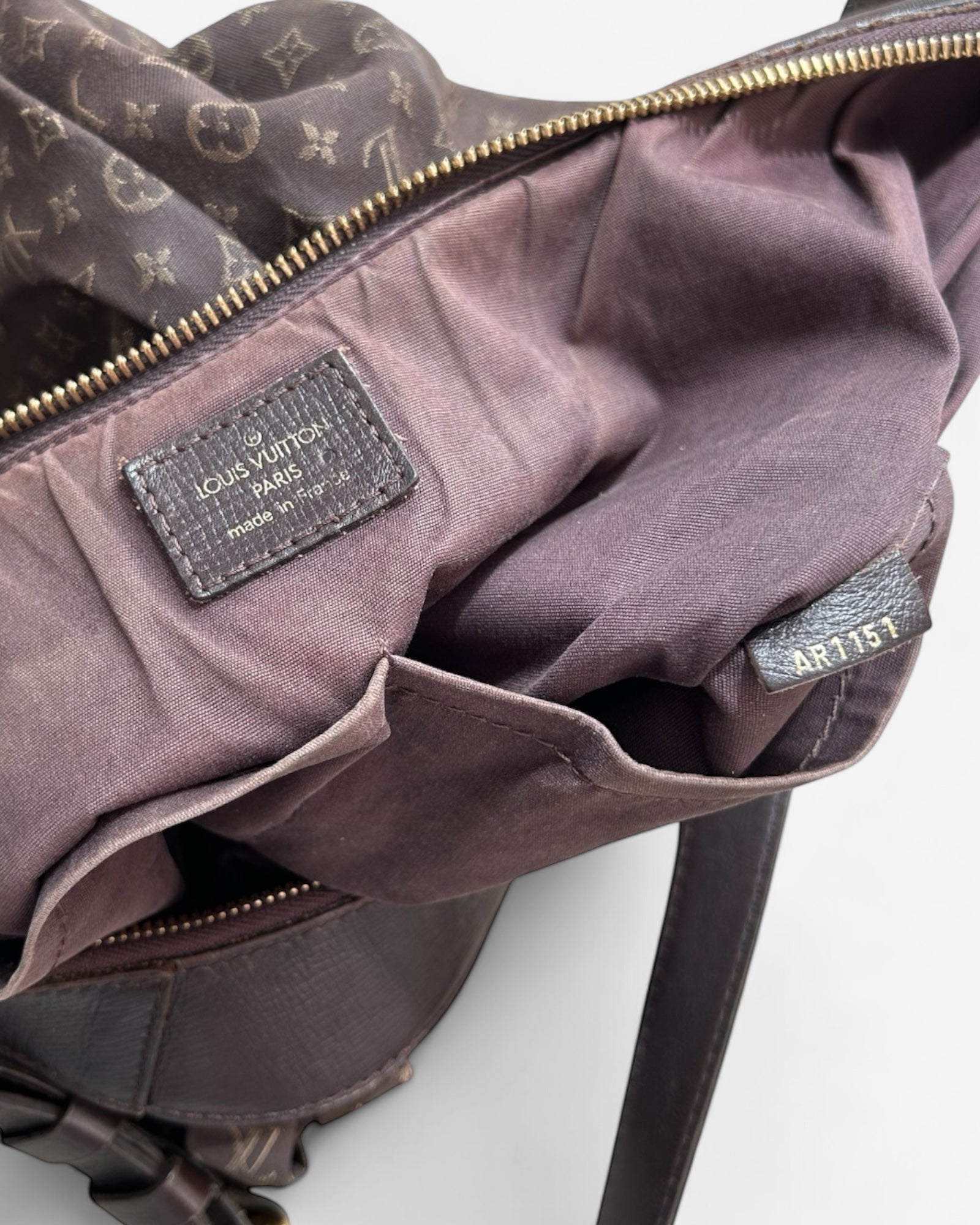 ingterior Close-up of Louis Vuitton Idylle Rhapsody MM in brown canvas