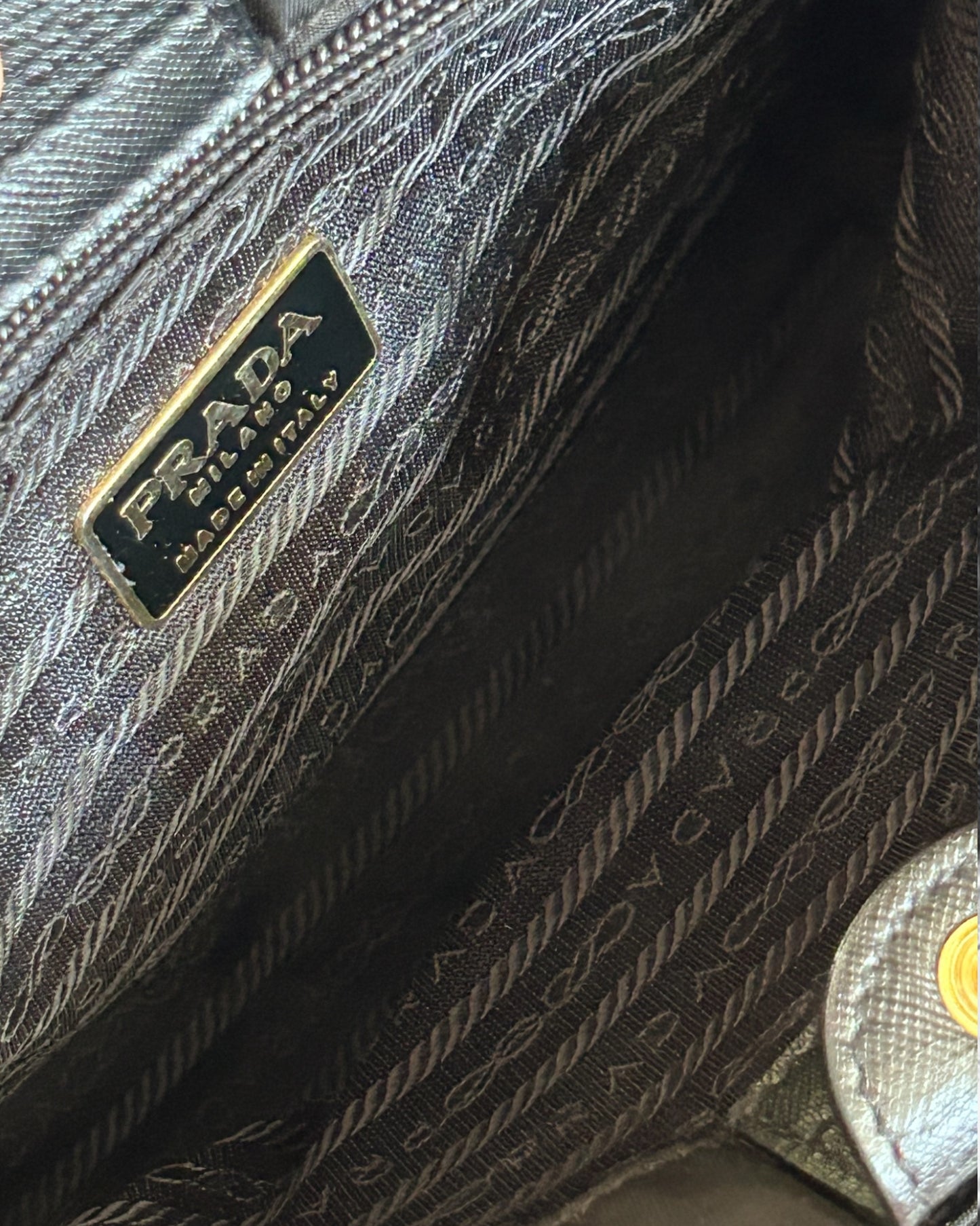 Interior of vintage Prada nylon chain shoulder bag – zip pocket and fabric lining