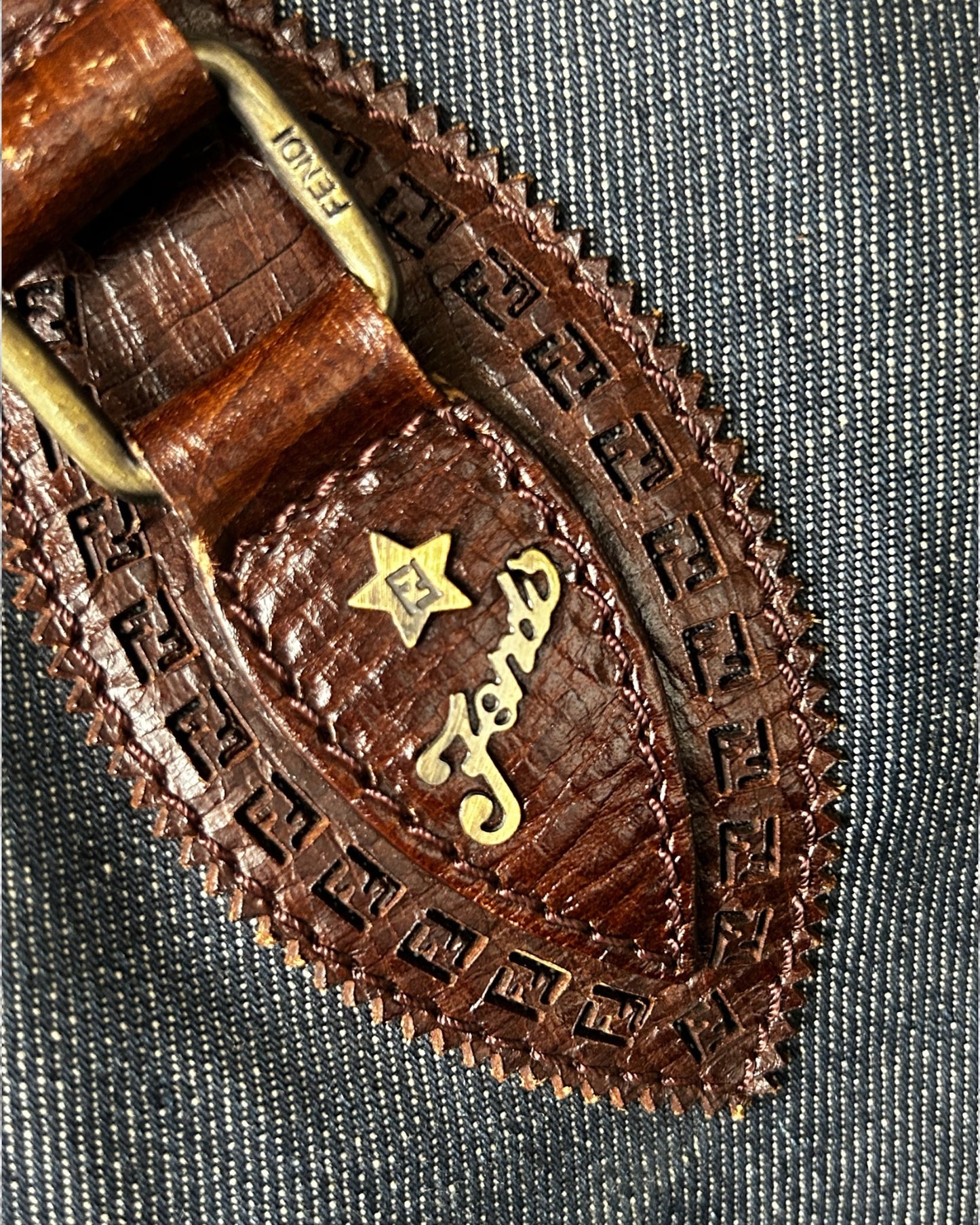 close-up of fendi logo on denim exterior