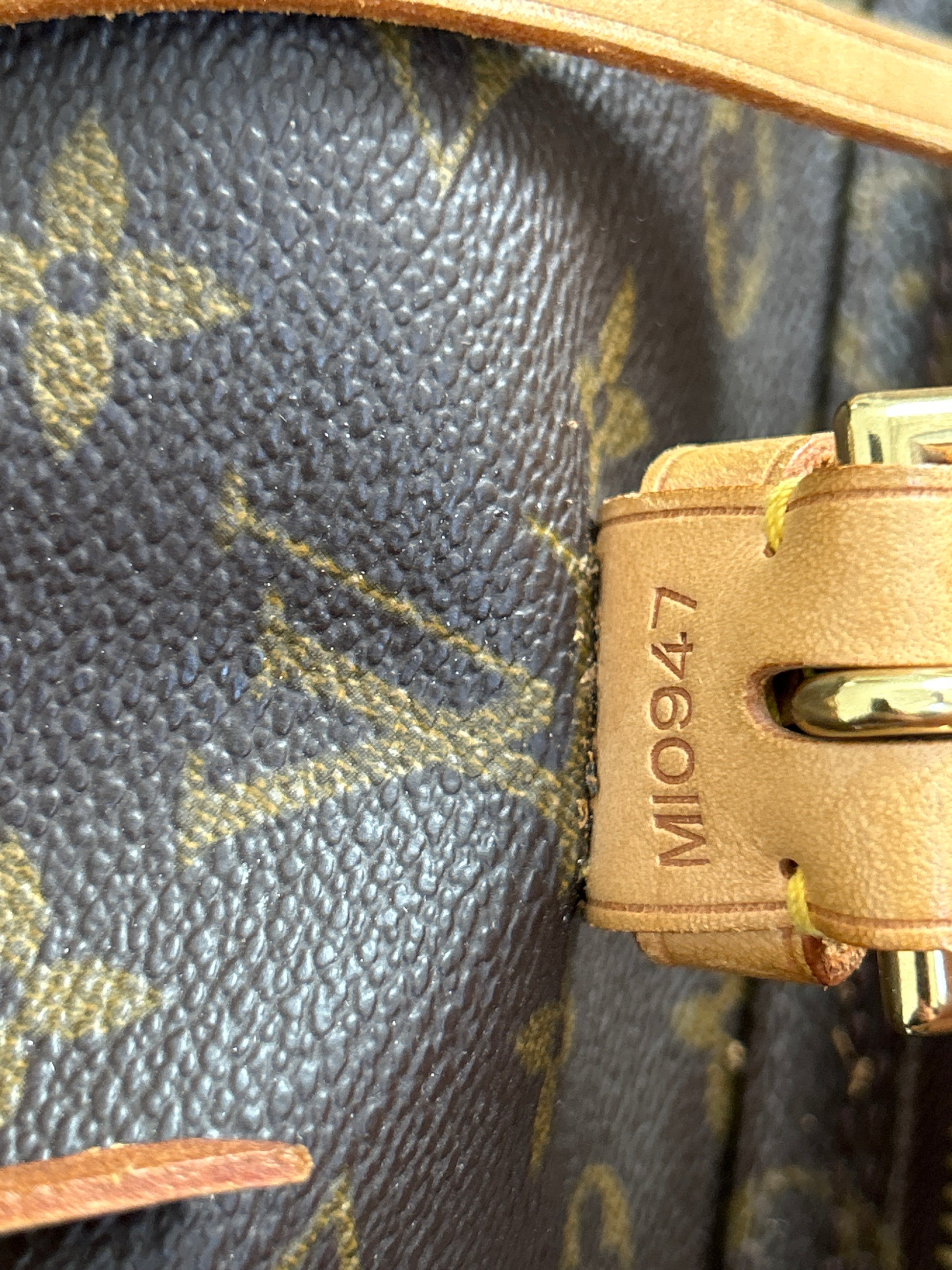 date code tag inside louis vuitton montsouris mm backpack