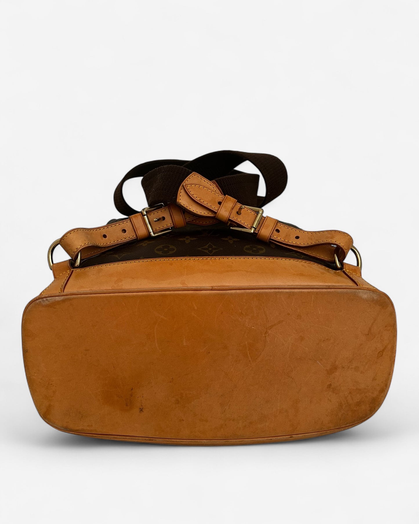 bottom view of lv montsouris bag showing leather base and corners