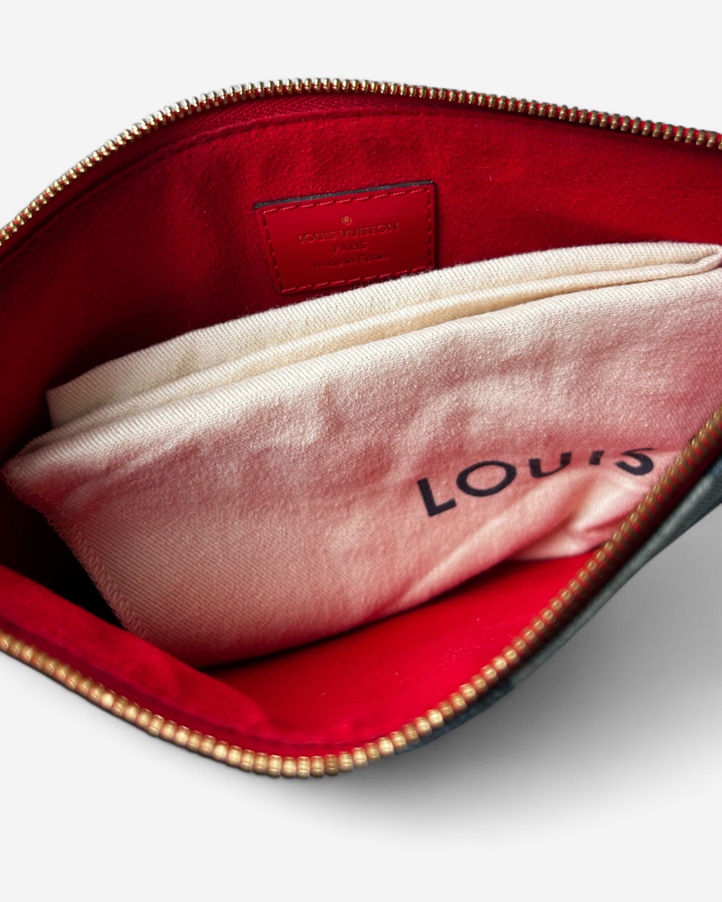 pre-loved louis vuitton pouch displayed with inclusions