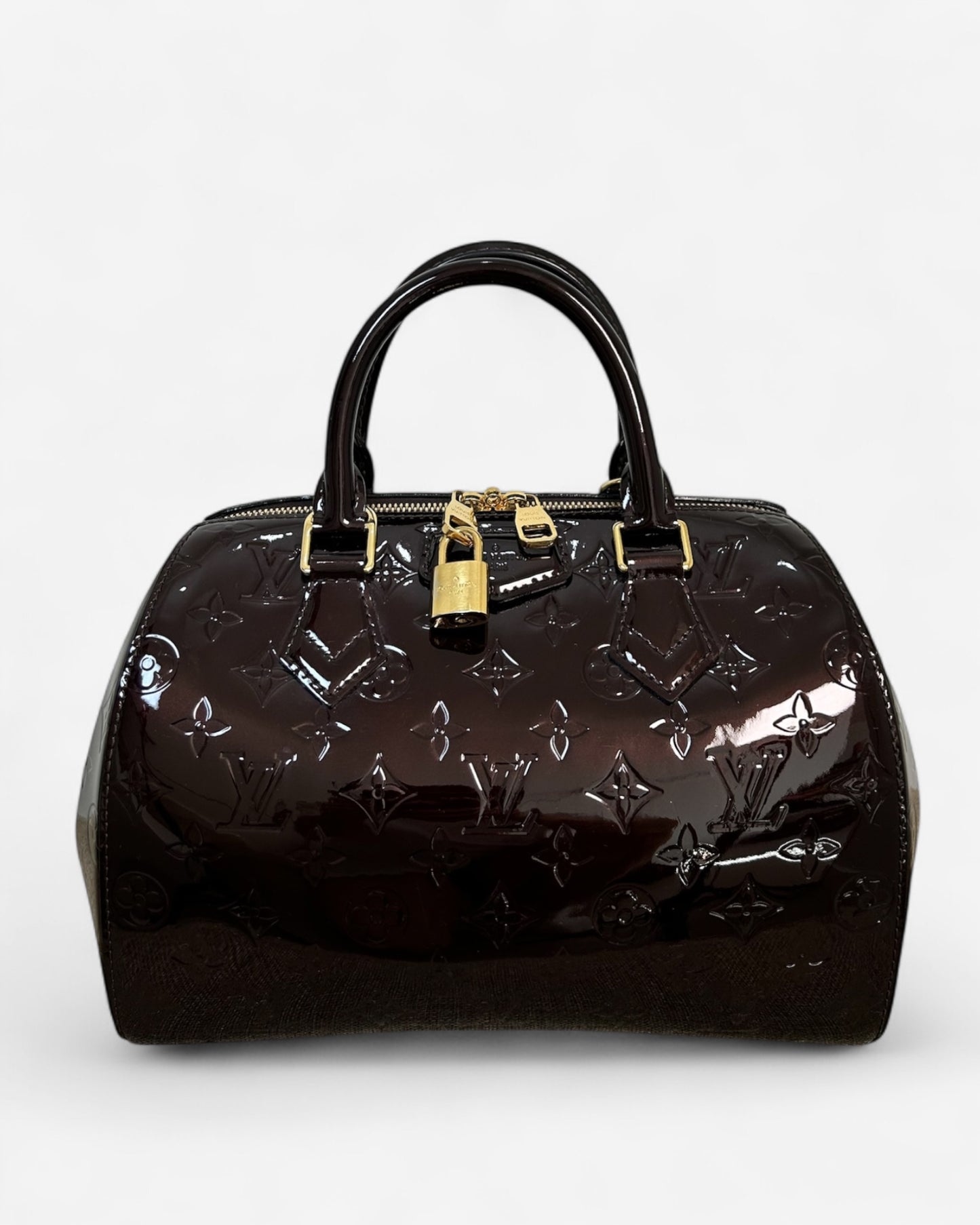 Vintage Louis Vuitton Montana handbag in glossy aubergine Monogram Vernis leather with gold-tone hardware and detachable strap
